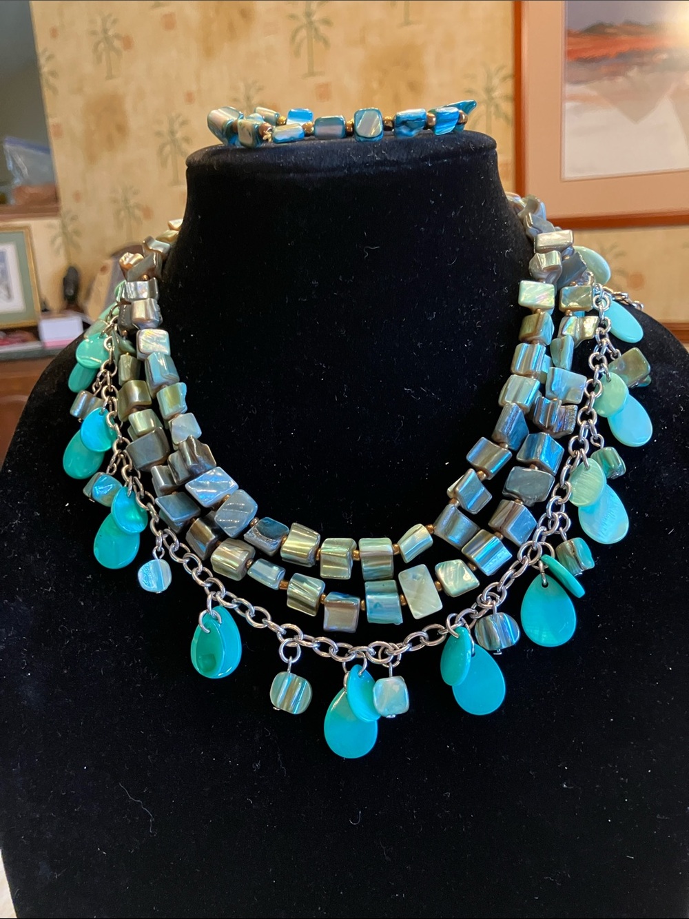 TWO MOTHER OF PEARL AND DYED ABALONE WITH BRACELET